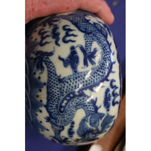 49 - A Chinese blue and white brush washer with dragon and flaming pearl decoration, four-character mark ... 