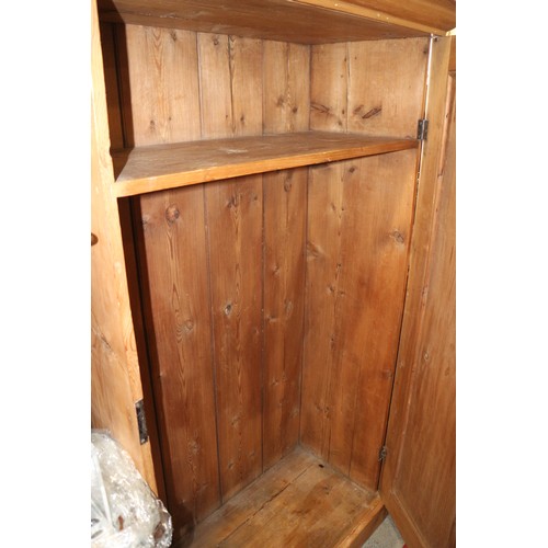 619 - A pine armoire enclosed single door, on block base, 40