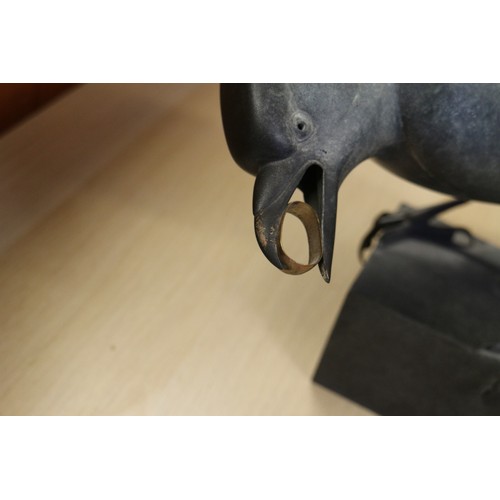 208 - †Geoffrey Dashwood: a patinated bronze jackdaw with yellow metal ring in its beak, 5/12, 8 1/2