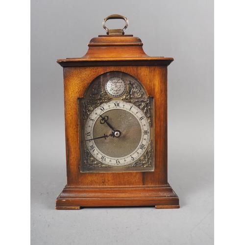 101 - A gilt brass shaped cased carriage clock, 5