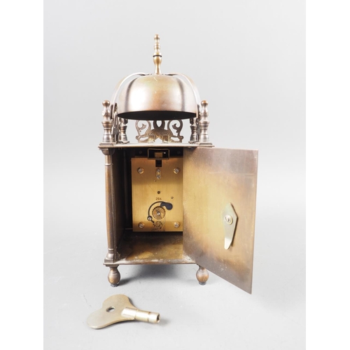 115 - A well reproduced brass lantern clock with carriage clock movement, 10