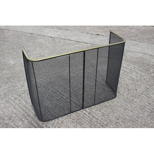 134 - A brass framed nursery spark guard, 36