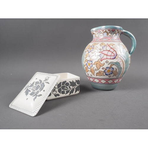 59 - A Bursley ware tube lined jug, by Charlotte Rhead, and a similar rectangular trinket box and cover