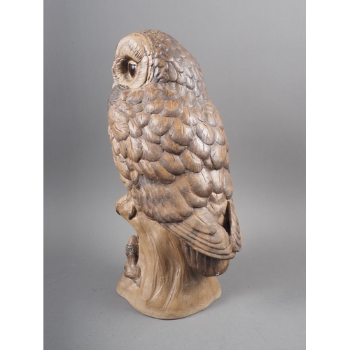 7 - A Poole pottery brown glazed model of an owl, by B Linley-Adams, 12 1/2