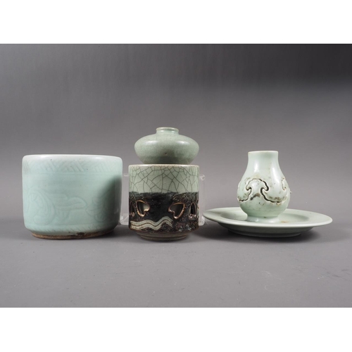 71 - Two Chinese celadon brush pots, a celadon glazed squat vase and a celadon glazed incense stand