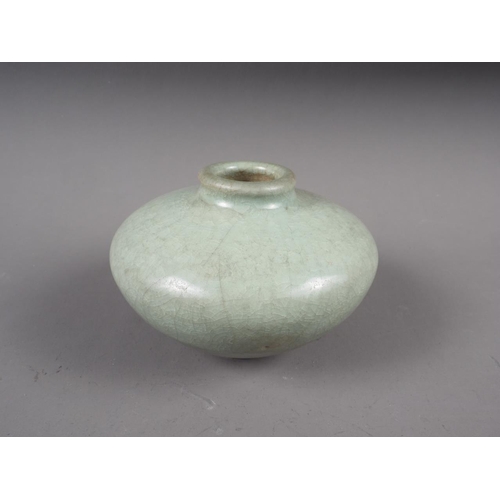 71 - Two Chinese celadon brush pots, a celadon glazed squat vase and a celadon glazed incense stand