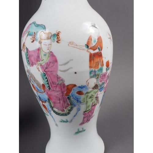 74 - A Chinese porcelain baluster vase, decorated four figures in a landscape, 9 1/2