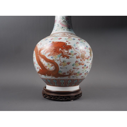 87 - A Chinese polychrome bulbous vase with Imperial five-toed dragon decoration and six-character mark, ... 