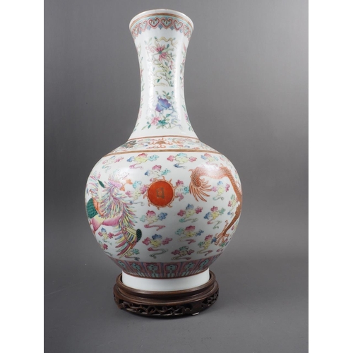 87 - A Chinese polychrome bulbous vase with Imperial five-toed dragon decoration and six-character mark, ... 