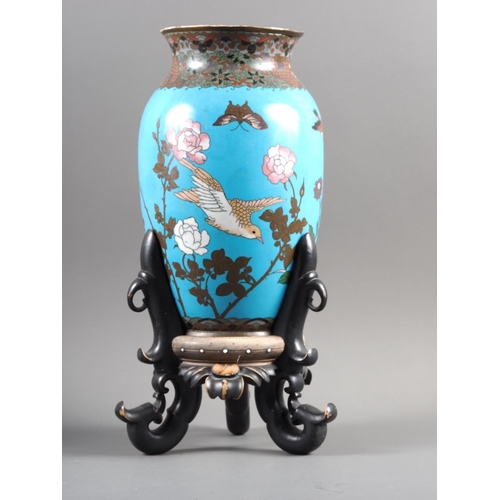 92 - A pair of Japanese cloisonne vases with dove and flower design on a turquoise ground (haircracks), o... 