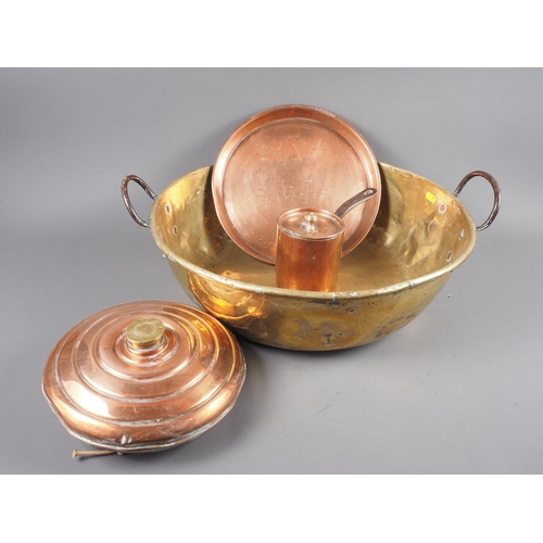 124 - A brass two-handled preserve pan, 22