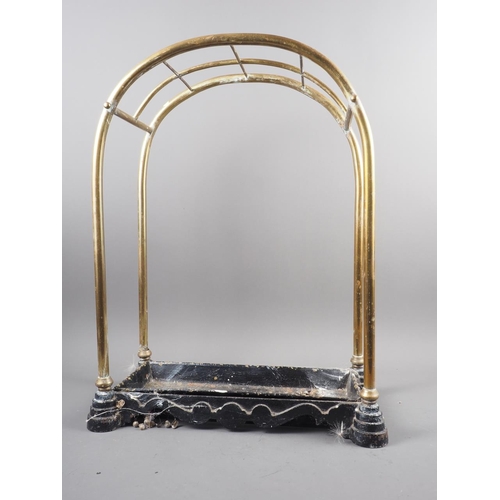 126 - A brass umbrella/stick stand with drip tray, 18