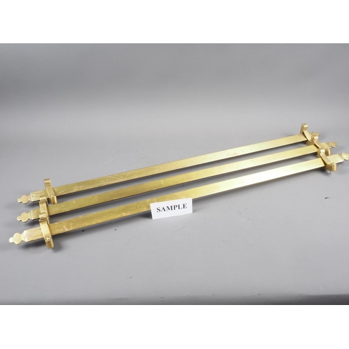 133 - A collection of twenty-four 19th century brass stair rods and fittings, 86cm long x 2.5cm wide