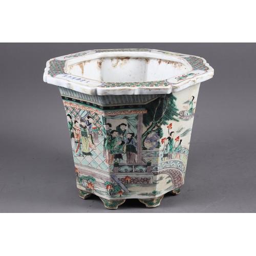 70 - A Chinese porcelain octagonal planter, decorated figures, 9