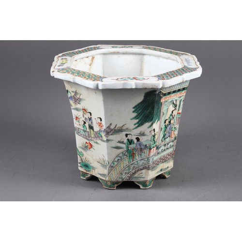 70 - A Chinese porcelain octagonal planter, decorated figures, 9