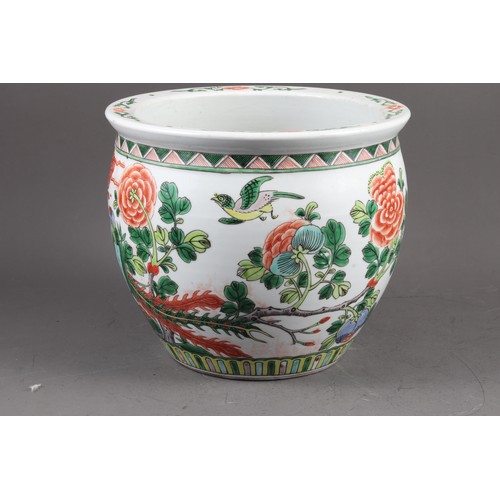 70 - A Chinese porcelain octagonal planter, decorated figures, 9