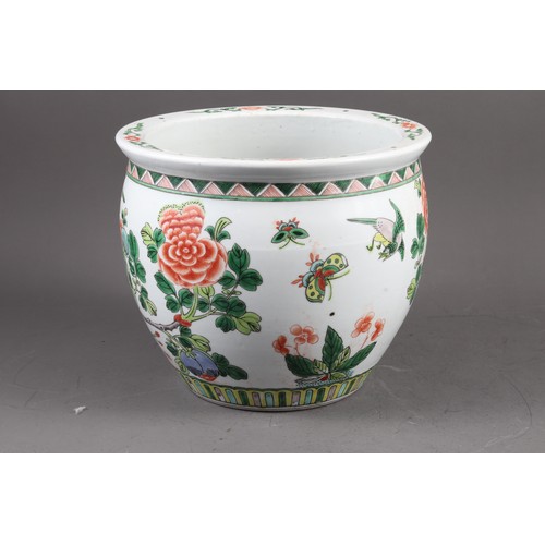 70 - A Chinese porcelain octagonal planter, decorated figures, 9