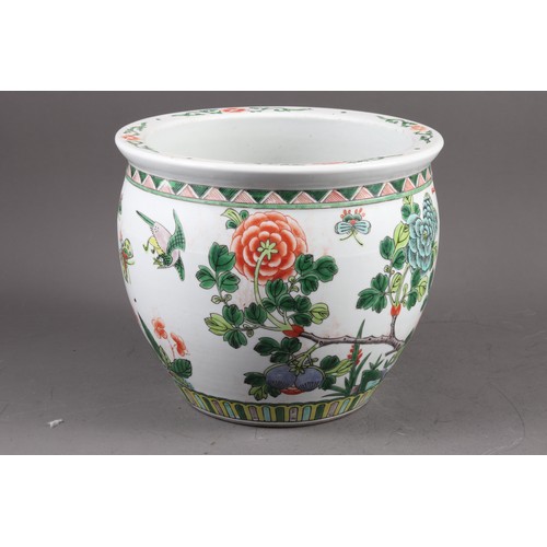 70 - A Chinese porcelain octagonal planter, decorated figures, 9