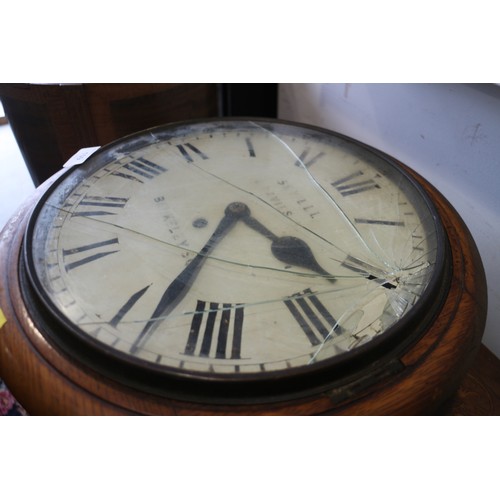 109 - An oak cased single fusee clock with enamelled dial and Roman numerals, signed Sevell, 4 Davies St, ... 