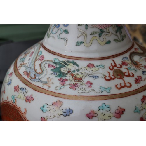 87 - A Chinese polychrome bulbous vase with Imperial five-toed dragon decoration and six-character mark, ... 