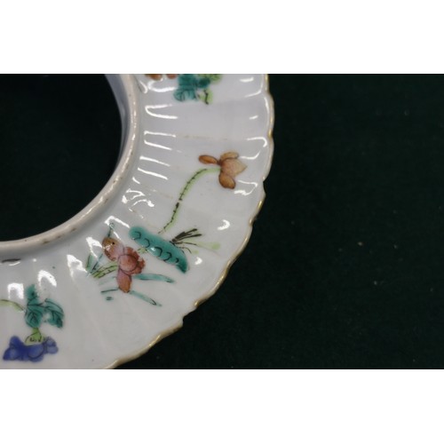 73 - A Chinese porcelain cloud shaped shallow dish, decorated insects, 9 1/2