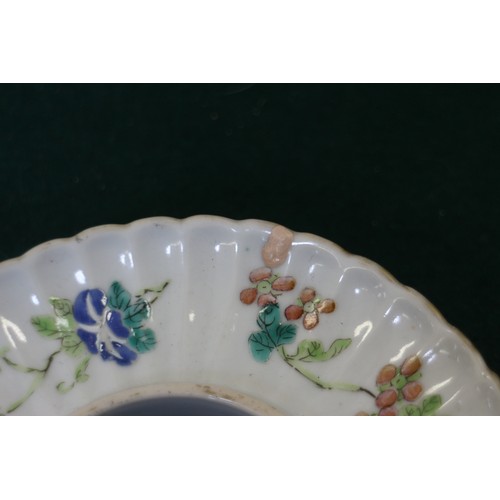 73 - A Chinese porcelain cloud shaped shallow dish, decorated insects, 9 1/2