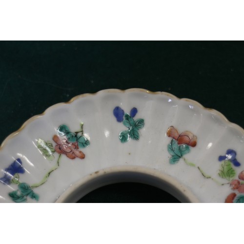 73 - A Chinese porcelain cloud shaped shallow dish, decorated insects, 9 1/2