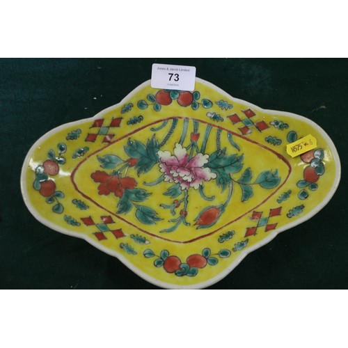 73 - A Chinese porcelain cloud shaped shallow dish, decorated insects, 9 1/2