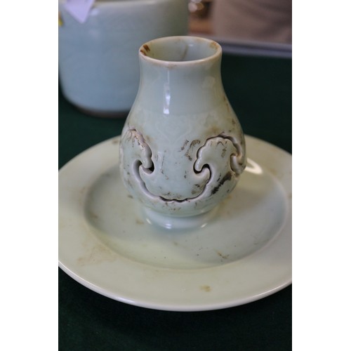 71 - Two Chinese celadon brush pots, a celadon glazed squat vase and a celadon glazed incense stand