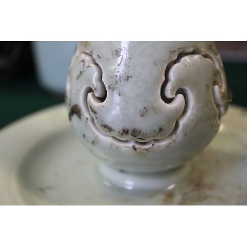 71 - Two Chinese celadon brush pots, a celadon glazed squat vase and a celadon glazed incense stand