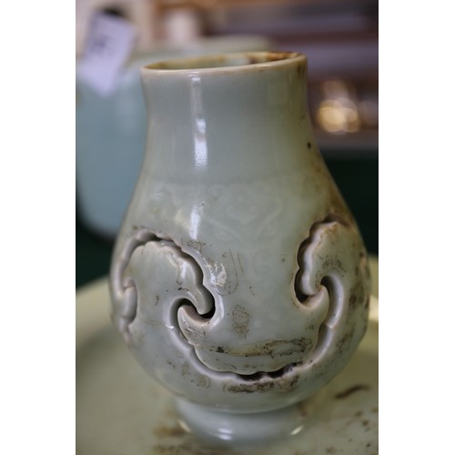 71 - Two Chinese celadon brush pots, a celadon glazed squat vase and a celadon glazed incense stand