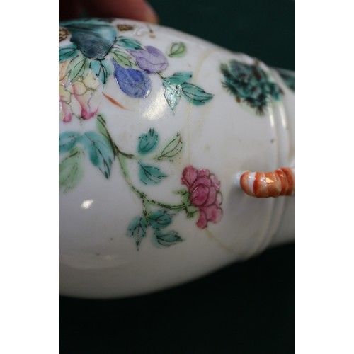 74 - A Chinese porcelain baluster vase, decorated four figures in a landscape, 9 1/2