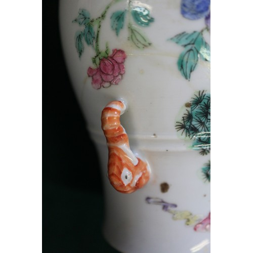 74 - A Chinese porcelain baluster vase, decorated four figures in a landscape, 9 1/2