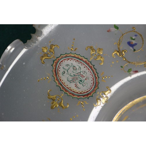 55 - A Bohemian opaque white glass shaped edge dish with gilt and enamelled scrolled and floral decoratio... 