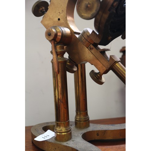 111 - A 19th century Ross brass binocular microscope, on stand number 5380, 19 1/2