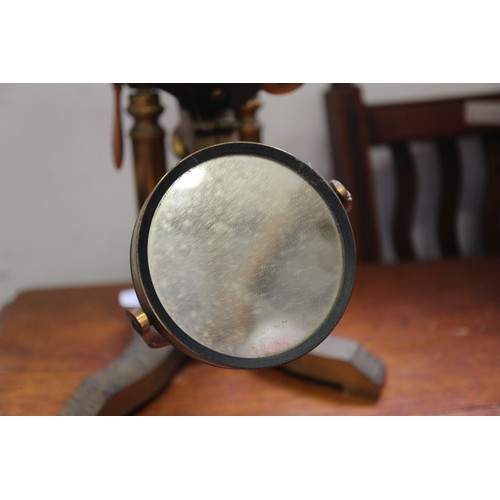 111 - A 19th century Ross brass binocular microscope, on stand number 5380, 19 1/2