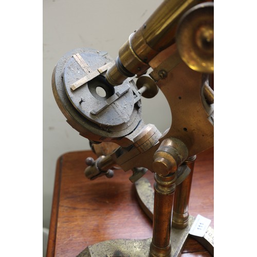 111 - A 19th century Ross brass binocular microscope, on stand number 5380, 19 1/2