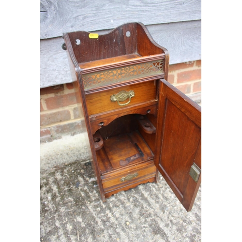 178 - A smoker's Edwardian carved mahogany cabinet with gallery top, fitted interior and one drawer, 8 1/4... 