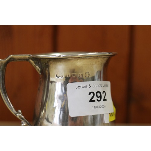 273 - A silver christening mug and a silver jug, 5.8oz troy approx