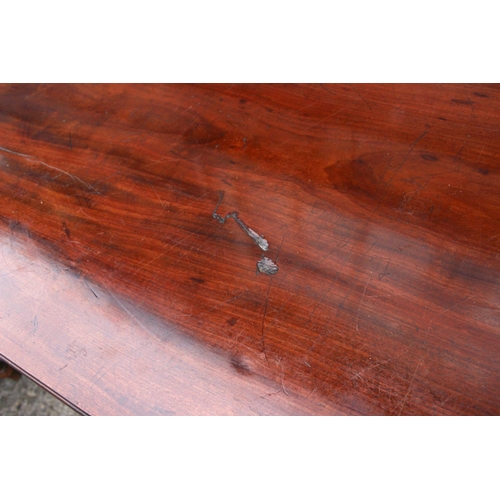 429 - A 19th century mahogany fold-over top tea table, on turned column and quadruple splay support, 36