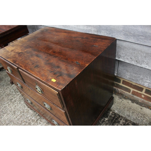 433 - A Georgian mahogany chest of two short and two long graduated drawers, on bracket feet, 29