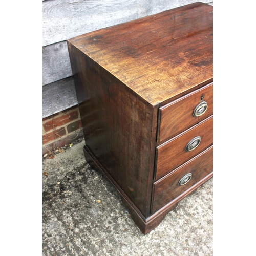 433 - A Georgian mahogany chest of two short and two long graduated drawers, on bracket feet, 29