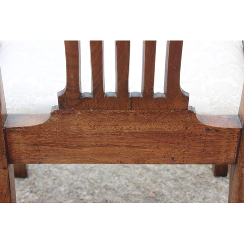 442 - A George III mahogany carver chair with pierced splat back and drop-in seat, on stretchered supports