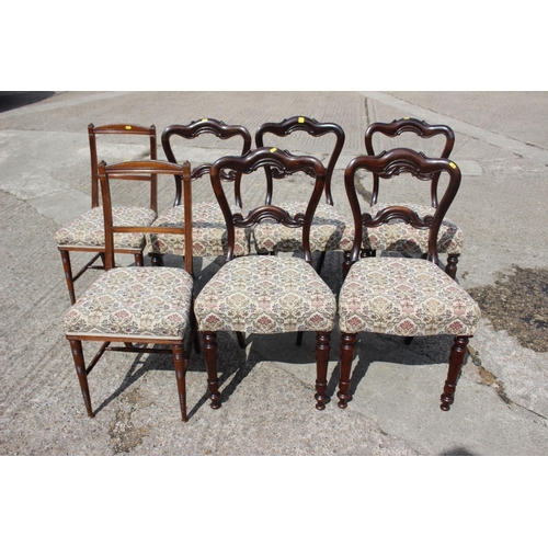 448 - A set of five mid 19th century rosewood bar back dining chairs with stuffed over seats, on turned su... 