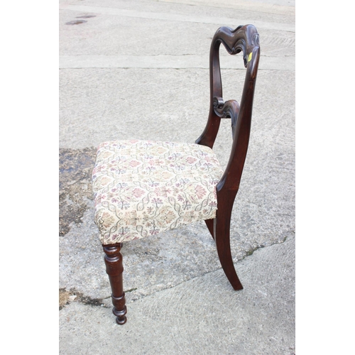 448 - A set of five mid 19th century rosewood bar back dining chairs with stuffed over seats, on turned su... 