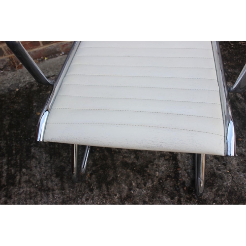 488 - An Eames style chrome-framed leather cantilever elbow chair