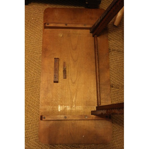 537 - An early 20th century pokerwork folding table, on 'X' frame supports, 30