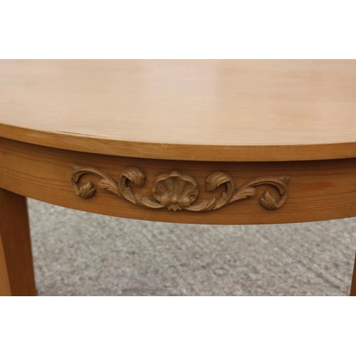 557 - A Halliday’s pine bed semicircular side table, on square taper supports, 42