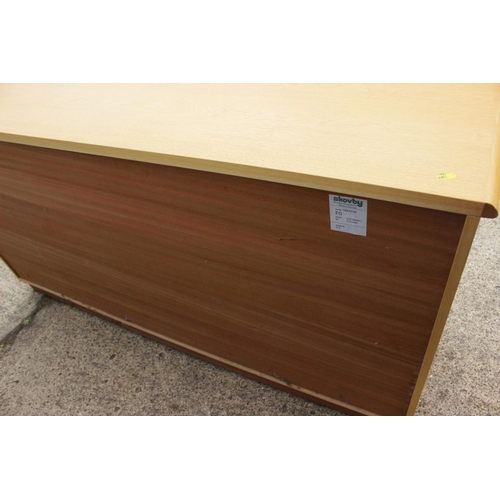 485 - A Skovby light oak side board, fitted three drawers over three cupboards, 66