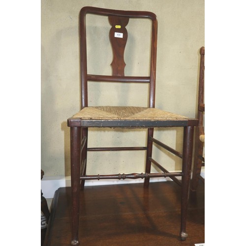 451 - A Windsor farmhouse elbow chair with pierced splat back panel seat and crinoline stretchered support... 